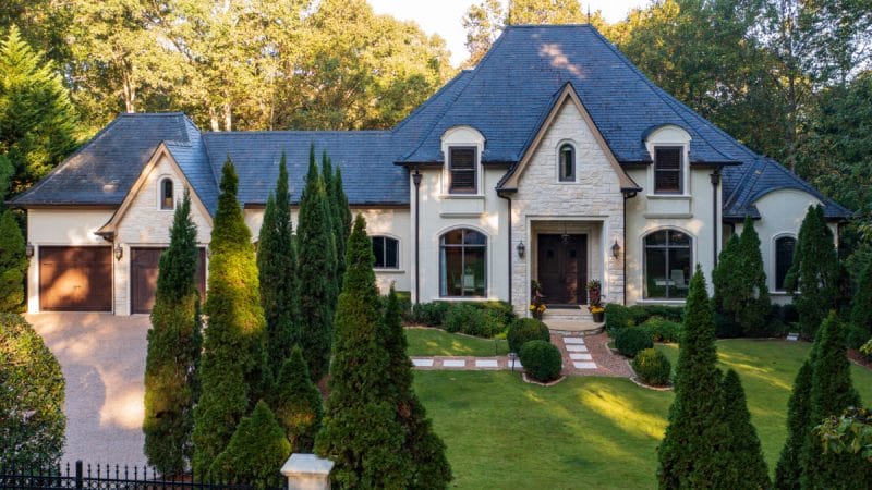 Stately Home Offers Manageable Scale And Acres Of Privacy In The Paces Neighborhood