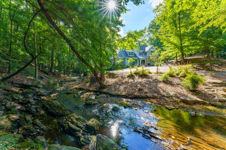 Custom home offers 4.5-Acre  streamside sanctuary in Vinings